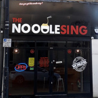 The Noodle Sing outside