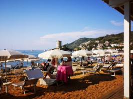 Lo Scoglio On The Beach outside