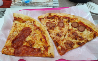 Pizzeria. Rosticceria Con Piatti Tipici Da Asporto E Polli Allo Spiedo. Rostipizza Frittura Di Pesce food