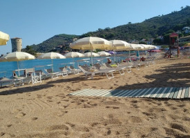 Lo Scoglio On The Beach outside