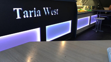 Taria West inside